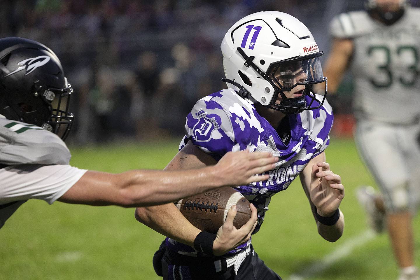 Dixon’s Jagger Kemp runs for yards against Rock Falls Friday, Sept. 12, 2025.