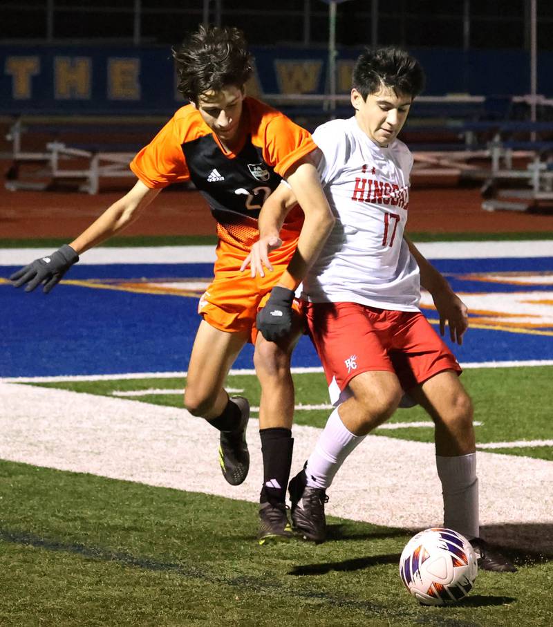 Hinsdale Central's Antonio Azzo holds off Hersey's Adam Myslinski Friday, Nov. 8, 2024, during their Class 3A state semifinal game at Hoffman Estates High School.