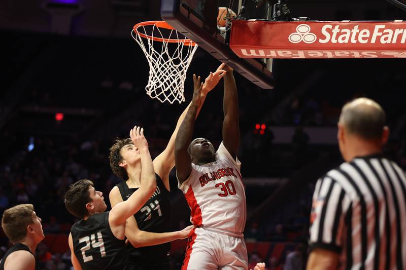 Bolingbrook’s Michael Osei-Bonsu lays in a shot against Glenbard West in the Class 4A semifinal at State Farm Center in Champaign. Friday, Mar. 11, 2022, in Champaign.