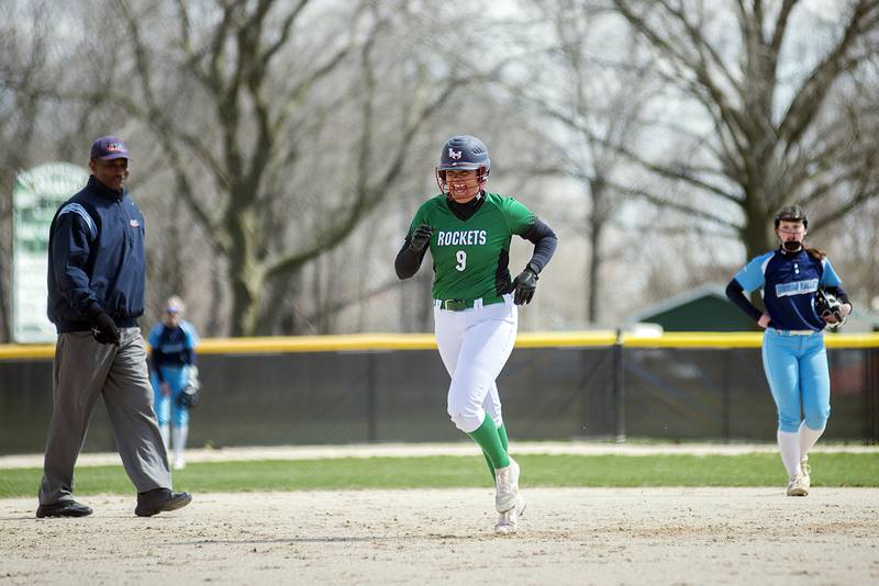 Rock Falls' Taylor Reyna smiles as she heads towards third after hitting a home run Saturday, April 16, 2022 against Bureau Valley.