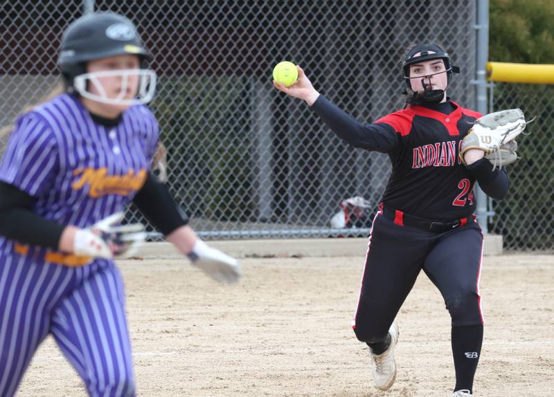 Indian Creek’s Emily Frazier throws out a Mendota baserunner during their game Thursday, March 14, 2024, at Indian Creek High School in Shabbona.