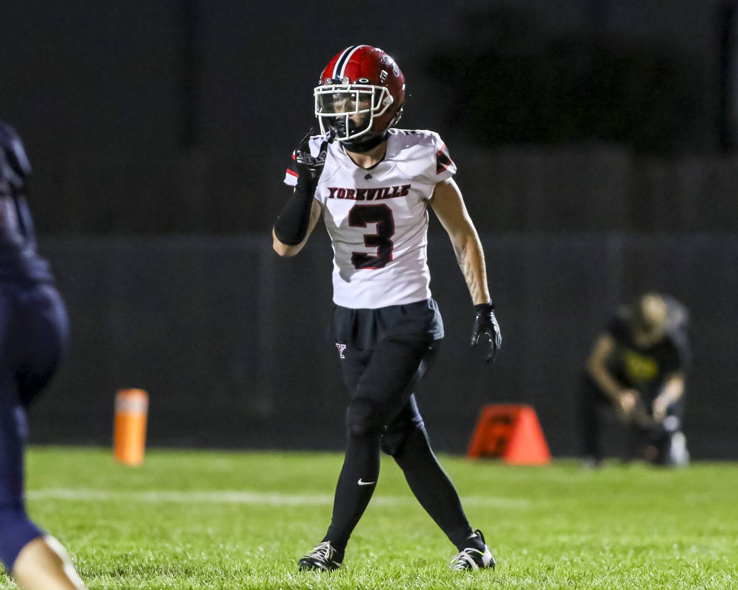 Yorkville's Luke Hendershott (3) gets the defense set during football game between Yorkville at Oswego Friday, Sept 26, 2025 in Oswego.