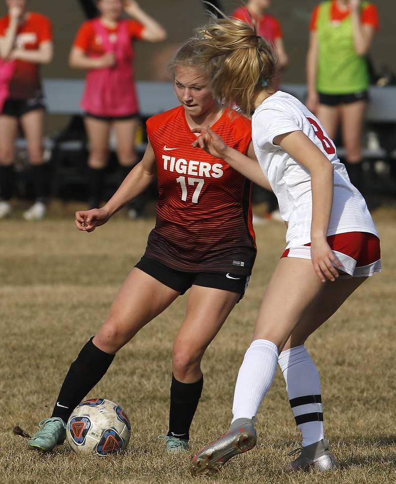 Crystal Lake Central's Olivia Anderson battles with Marian Central's Sidney Gerstenkorn for control of of ball during a non-conference soccer match Monday, March 21, 2022, between Crystal Lake Central and Marian Central at Crystal Lake Central High School.