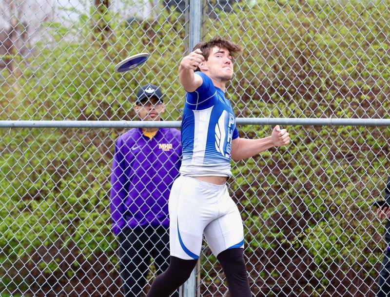 Princeton senior Ian Morris launches the discus in Monday's Ferris Invite. He placed second.