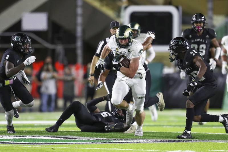 Colorado State tight end Trey McBride looks to run after making a catch against Hawaii on Nov. 20, 2021 in Honolulu.