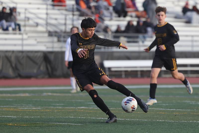 Joliet West’s Alex Garcia scores against East Moline United in the Class 3A Joliet West Regional semifinal on Tuesday.