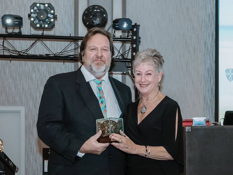 Former McHenry Mayor Sue Low Meyer, right, poses with Patrick Gorniak at the McHenry Area Chamber of Commerce gala on Jan. 25, 2025, after presenting Gorniak with the Frank E. Low award.