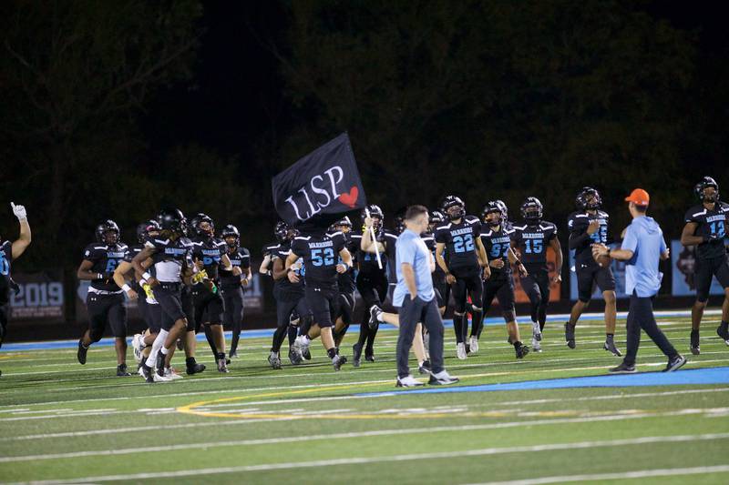Willowbrook takes the field against Downers Grove South on Friday, Sept. 20, 2024 in Villa Park.