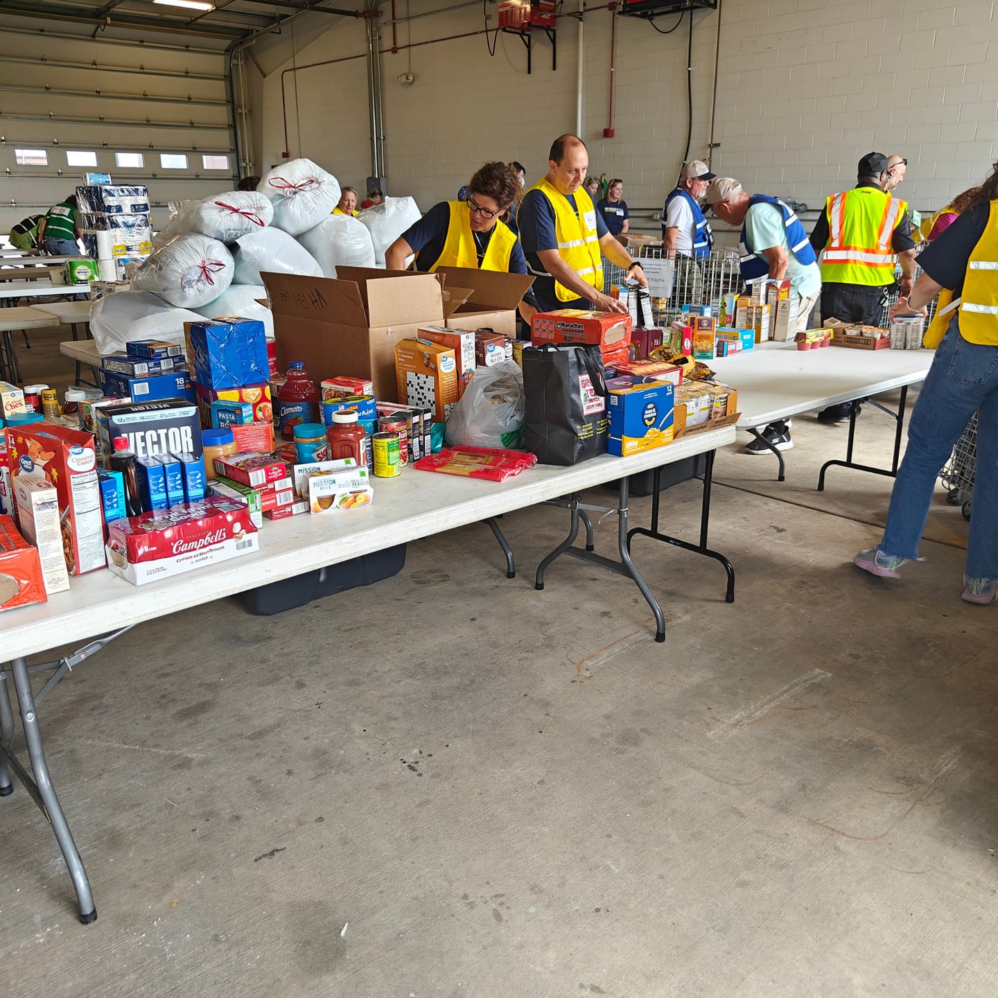 Volunteers sort donations from this year's Operation Dropbox collection in Lake County.