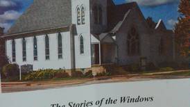 Oswego church releases book on its historical stained-glass windows