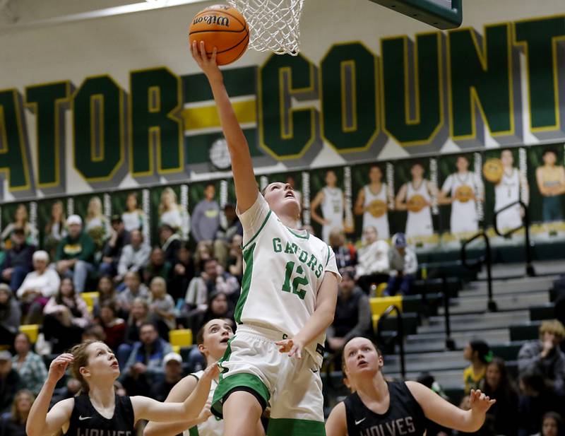Crystal Lake South's Gaby Dzik drives to the basket during a Fox Valley Conference girls basketball game against Prairie Ridge on Friday, Dec. 13, 2024, at Crystal Lake South High School.