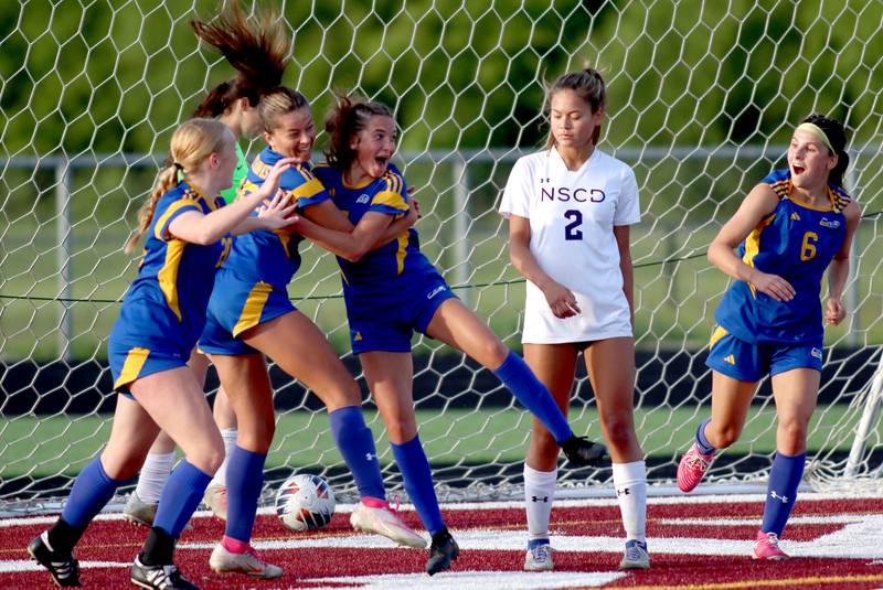 From left, Johnsburg’s Kayla Hiller, Lauren McQuiston, Charlie Eastland and Liz Smith celebrate the Skyhawks’ second goal against North Shore Country Day in IHSA Class 1A Sectional Title Game action at Richmond-Burton High School in Richmond on Tuesday, May 27, 2025.