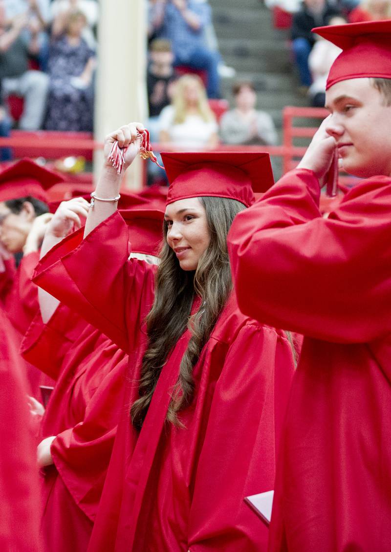 Ottawa High School graduates move their tassels Friday, May 27, 2022.