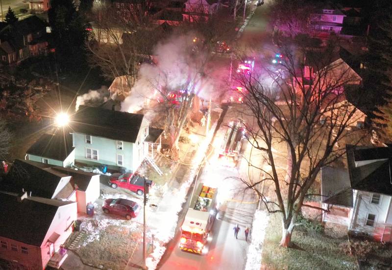 Firefighters work the scene of a structure fire in the 300 block of South Chestnut Street on Friday, Dec. 19, 2025 in Princeton.  Fire departments from  from Malden, Bureau, Walnut, Princeton, Spring Valley, Ladd and Wyanet all responded to the scene.