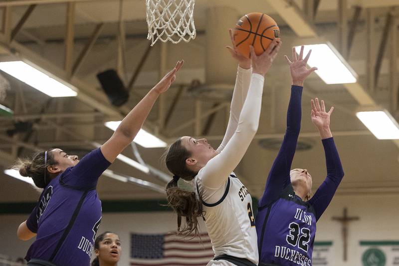Sterling’s Madison Austin puts up a shot against Dixon Thursday, Feb. 27, 2025, during the Class 3A girls Sectional title at Rockford Boylan High School.