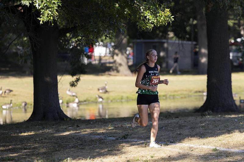 Rock Falls’ Kat Scott heads for the finish to take first in the girls’ race Tuesday, Sept. 16, 2025, at the Twin Cities Triangular in Rock Falls.