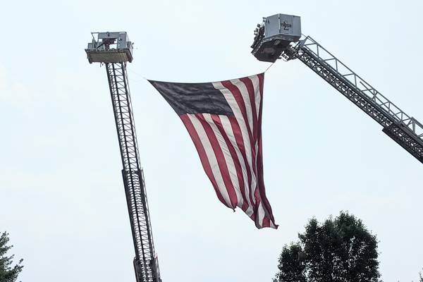 Area firefighters honor retired Oswego firefighter after his passing 