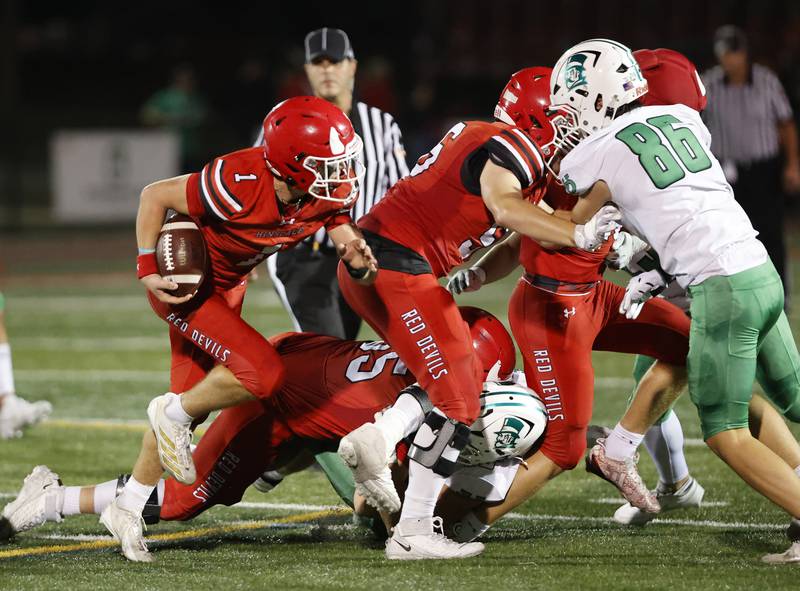 Hinsdale Central's Riley Contreras (1) tries to get past the defense during the varsity football game between York and Hinsdale Central on Friday, Oct. 3, 2025 in Hinsdale, IL