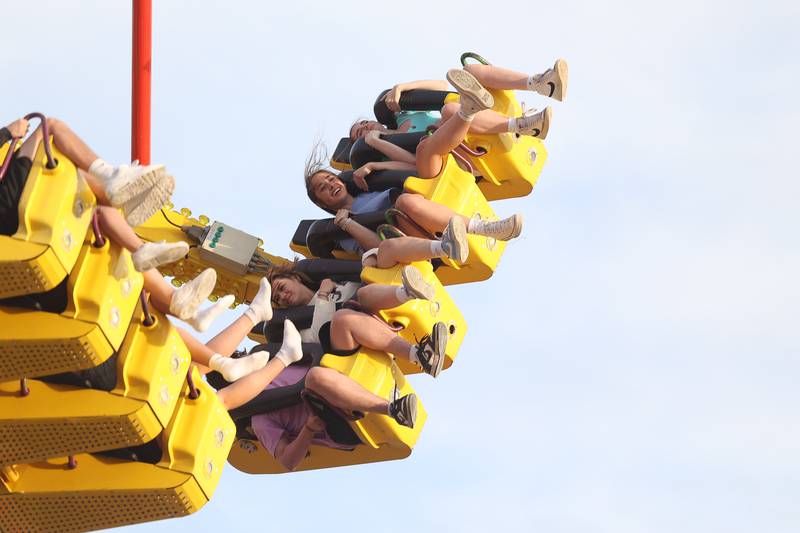A group of teen brave one of the extreme rides at Old Canal Days on Friday June 7, 2024 in Lockport.