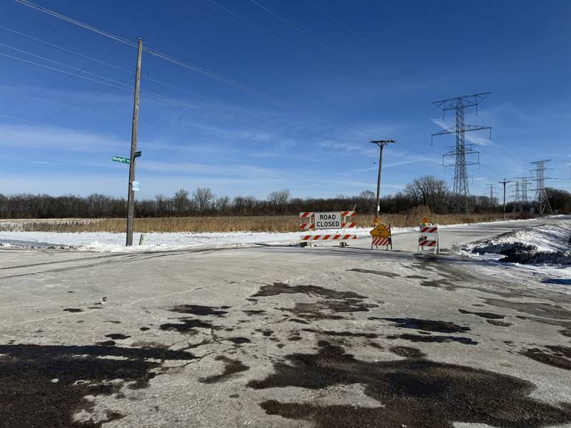 A road closure sign warns drivers along Phelan Acres Road in Wilmington of possible flooding due to ice jams along the Kankakee River on Wednesday, Jan. 17, 2023.  The Will County Emergency Management Agency and National Weather Service issued warnings Tuesday and Wednesday.