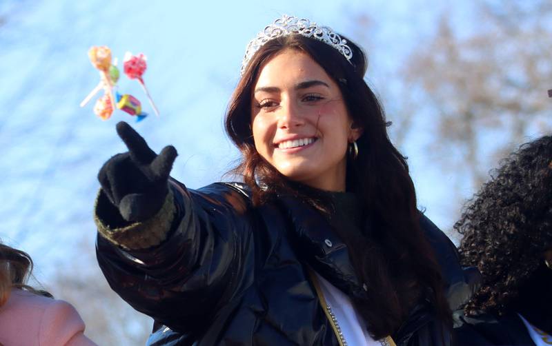 Miss Cary-Grove 2025 Faye Hahnfeld tosses candy during the Merry Cary Christmas Parade in Cary on Sunday, Dec. 7, 2025 in Cary.