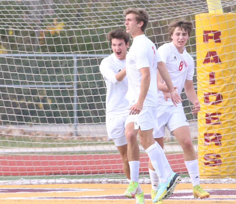 Timothy Christian players Noah Laslo, Caleb Hoekstra and Jake Firnsin celebrate after scoring a goal against Wheaton Academy during the Class 1A State soccer third place game on Saturday, Oct. 29, 2022 at EastSide Centre in Peoria.