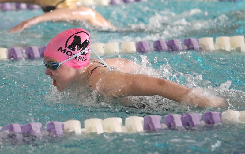 Morris's Audrey James competes in the 100 yard butterfly on Tuesday, Oct. 8, 2024 at the Illinois Valley YMCA in Peru.