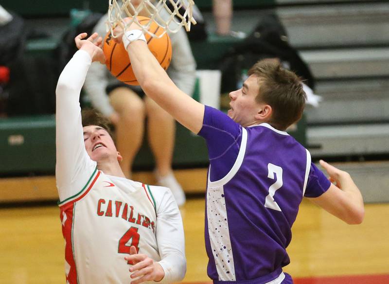 Rochelle's Van Gerber blocks L-P's John Sowers shot on Friday, Feb. 13, 2026 in Sellett Gymnasium at L-P High School.