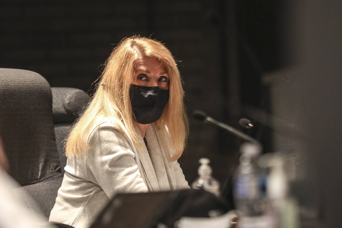 Councilwoman Jan Quillman speaks with her co-council-members on Wednesday, April 14, 2021, at Joliet City Hall in Joliet, Ill. Local activists asked to table a proposal for a citizens police review board in order to collect more community feedback.