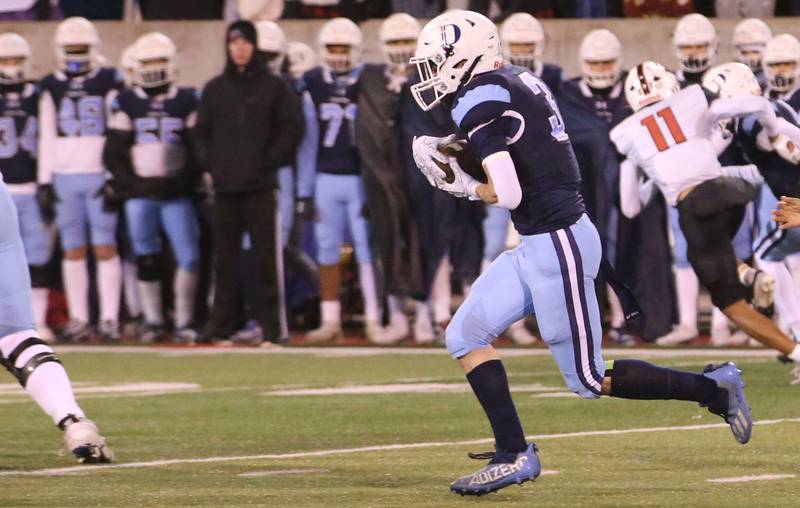 DePaul's Nick Martinez runs the ball against Mt. Zion during the Class 4A State football championship on Friday, Nov. 29, 2024 at Hancock Stadium in Normal.