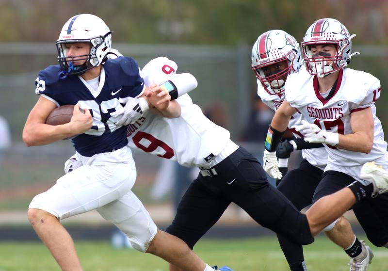Cary-Grove’s Trae Kole runs the ball against Antioch in IHSA Class 6A second-round playoff football action on Saturday, Nov. 9, 2024, at Al Bohrer Field on the campus of Cary-Grove High School in Cary..