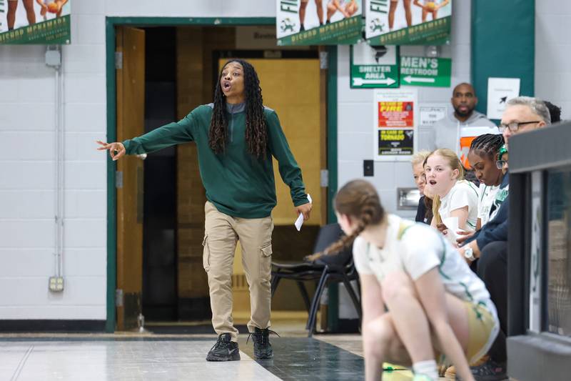 Bishop McNamara head coach Khadaizha Sanders communicates to her players during the Fightin' Irish's 67-27 victory over Chicago Christian on Monday, Jan. 26, 2026.