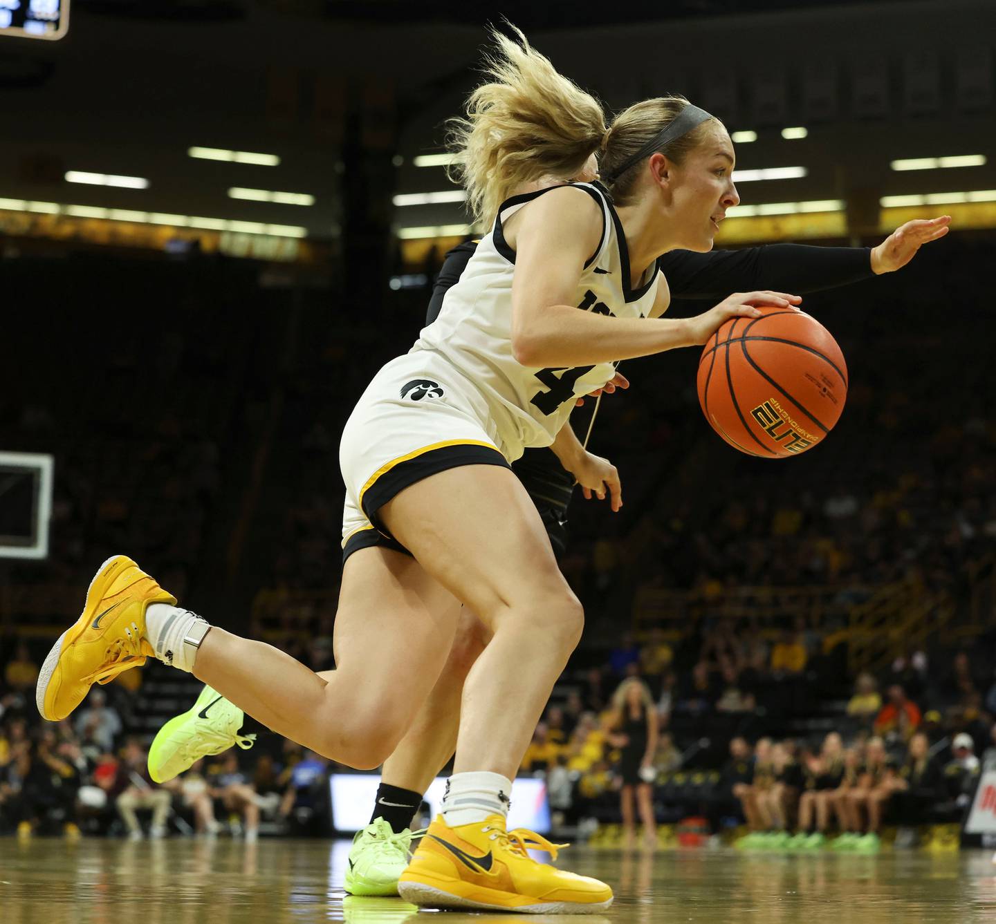 Iowa Hawkeyes guard Kylie Feuerbach dribbles up the court (4) during their exhibition game against Missouri Western at Carver-Hawkeye Arena in Iowa City, Iowa, on Wednesday, October 30, 2024. (Jerod Ringwald/hawkeyesports.com)