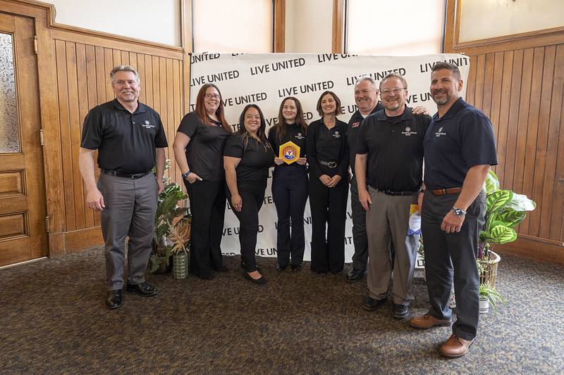 Representatives from Sterling Federal Bank receive the Business Champion of the Year award Tuesday, May 12, 2026, during the United Way of Lee County 2025 campaign celebration.