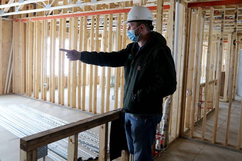 Axel Mozal, assistant superintendent of Joseph J. Duffy Co., shows some of the living arrangements inside the new Berkshire Johnsburg apartment building on Monday, Feb. 8, 2021 in Johnsburg.  The new Berkshire Johnsburg apartment building will have 68 total units, all of which qualify as affordable housing for seniors.