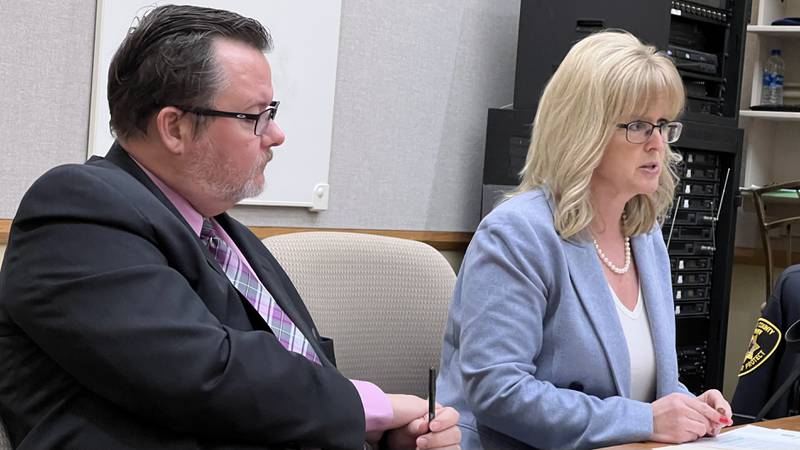 DeKalb County Circuit Clerk Lori Grubbs, right, talks to the Dekalb County Law and Justice Committee on Monday, Feb. 27, 2023 about her request to change two court fees.