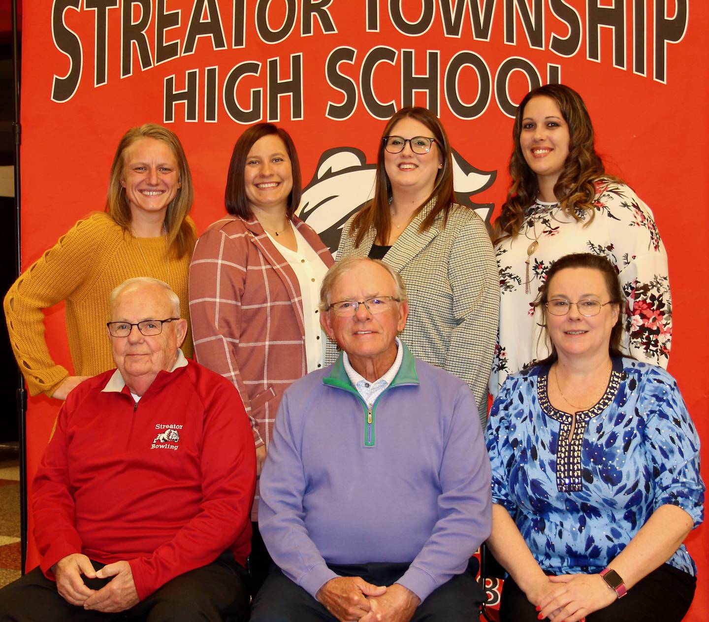 Streator's 2006 girls bowling team members in attendance at the 2022 Streator Sports Hall of Fame induction ceremony were (left to right): sitting - coaches Tom Rice, Ron Ramza and Nancy Longnecker; standing - players Jackie Leonard, Kayla (Tyne) Bradley, Sara (Rakoczy) McFadden and Jessica Leskanich.