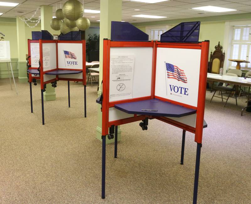 Vacant voter booths are empty at the polling place located at Zion United Church of Christ on Tuesday, April 4, 2023 in Peru.