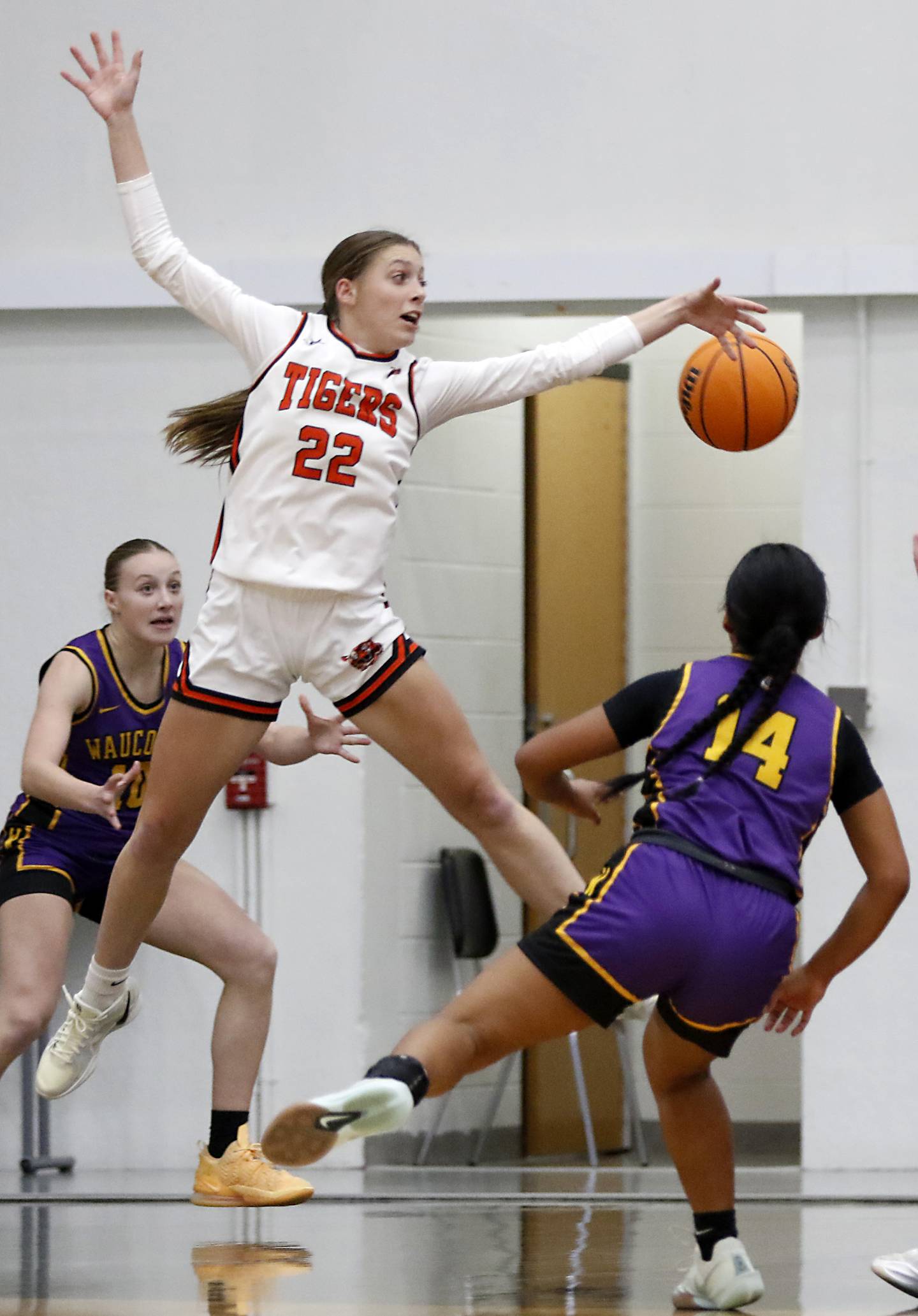 Crystal Lake Central's Peyton McMahon looks a Wauconda pass during the Northern Illinois Holiday Classic Championship game on Thursday, Dec. 19, 2024, at McHenry High School.