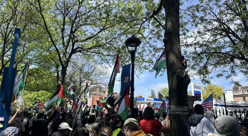 Students at DePaul University’s Gaza Solidarity Encampment face counterprotestors in May 2024.