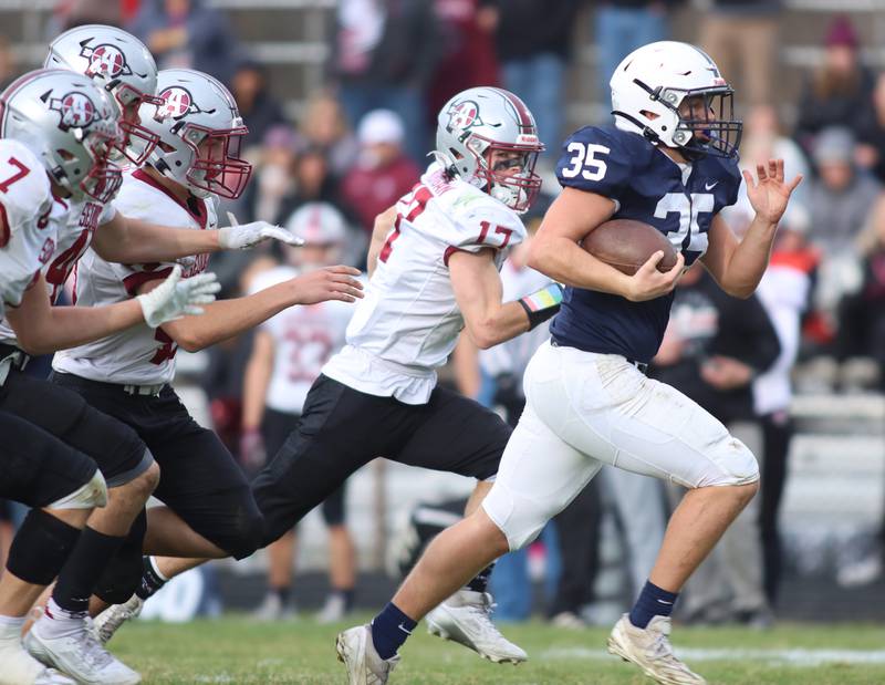 Cary-Grove’s Michael Massat breaks free for a long run against Antioch in IHSA Class 6A second-round playoff football action on Saturday, Nov. 9, 2024, at Al Bohrer Field on the campus of Cary-Grove High School in Cary..