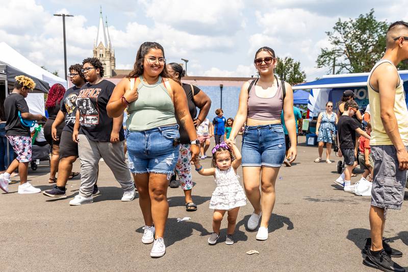 Chicago residents Stephanie Marquez, Everley Guitron, and Natalie Guitron enjoy Kidz Fest in Joliet on Aug. 3, 2024.