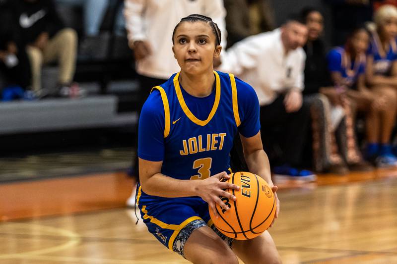 Joliet Central's Nevaeh Wright prepares to shoot during a WJOL Girls Basketball Tournament game against Minooka at Minooka on Nov. 19, 2025