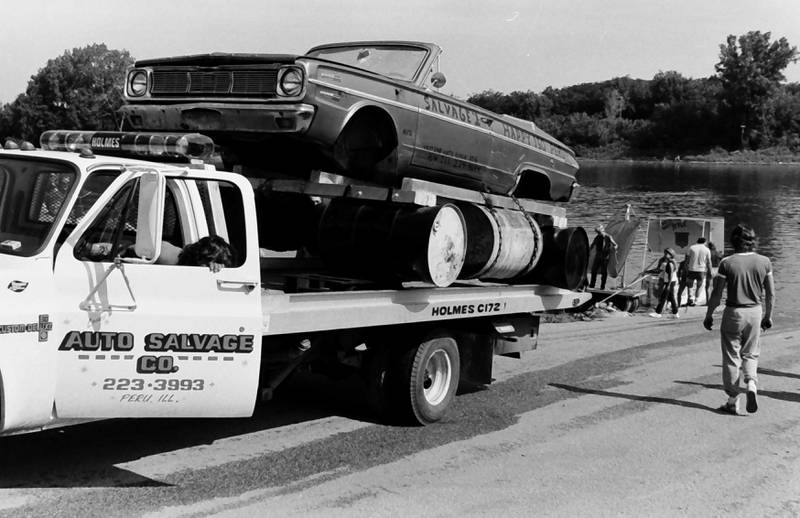 The Anything That Floats races were held from 1978-1986 each year in Peru. Contestants received a free case of Old Style beer upon entering. The rules were simple. To enter, participants needed to build a raft less than 50 feet in length and each person had to have a life jacket on board whether you wore it or not. A rope had to be attached to the raft for towing. Rafts were made from styrofoam, inter tubes or barrels. A minimum of two paddles were required on the float. Rafts were launched at the Starved Rock Boat Ramp and finished at the Peru boat launch area. Over time, the event grew and got to big and out of control that organizers had to scrap it. This photo was found in the La Salle NewsTribune archives.