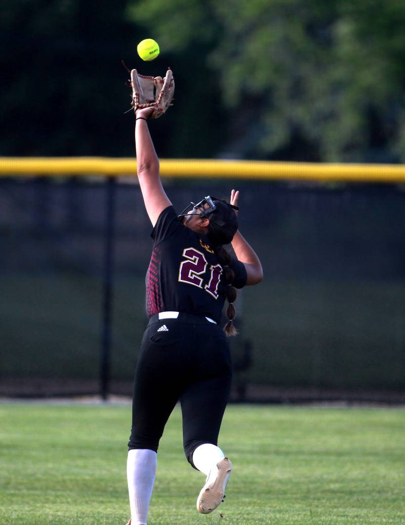 Montini’s Ariana Macias reaches for the catch during a Class 3A Benedictine Supersectional against St. Laurence on Monday, June 9, 2025 in Lisle.