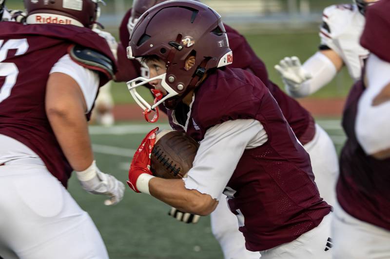 Lockport's Adam Kruczak makes a move during a varsity football home game against Plainfield North on Aug. 29, 2025.