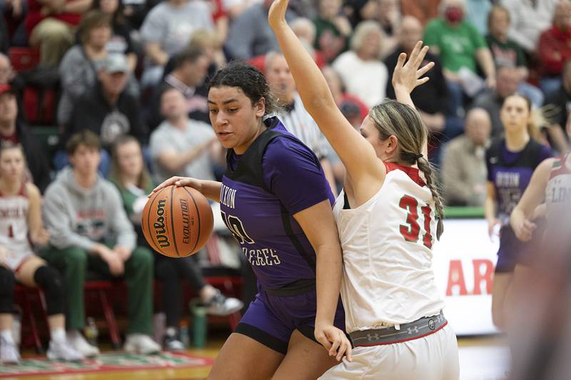 Dixon’s Hallie Williamson works against Lincoln’s Makinley Knapp in the class 3A super sectional Monday, Feb. 26, 2024 at LaSalle-Peru High School.