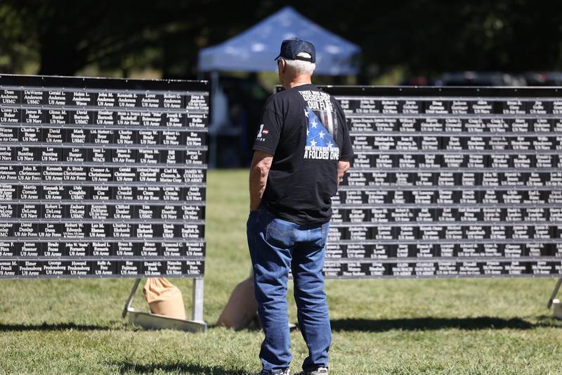 Air Force veteran and retired Channahon Police Chief Steve Admonis visits the Dwight VFW Veteran’s Wall at the 11th Annual Operation Firm Handshake Veteran’s Picnic on Saturday, Sept. 7, 2024 in Coal City.