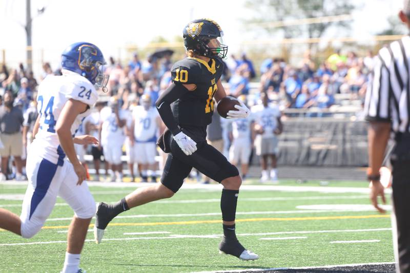 Joliet West’s Parker Schwarting trots into the end zone on pass from Alexander Cruz against Joliet Central on Saturday, Sept. 23, 2023 in Joliet.