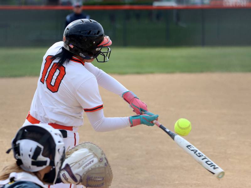 Crystal Lake Central’s Liv Shaw makes contact against Harvard in varsity softball at Crystal Lake Central High School in Crystal Lake on Monday, May 19, 2025.